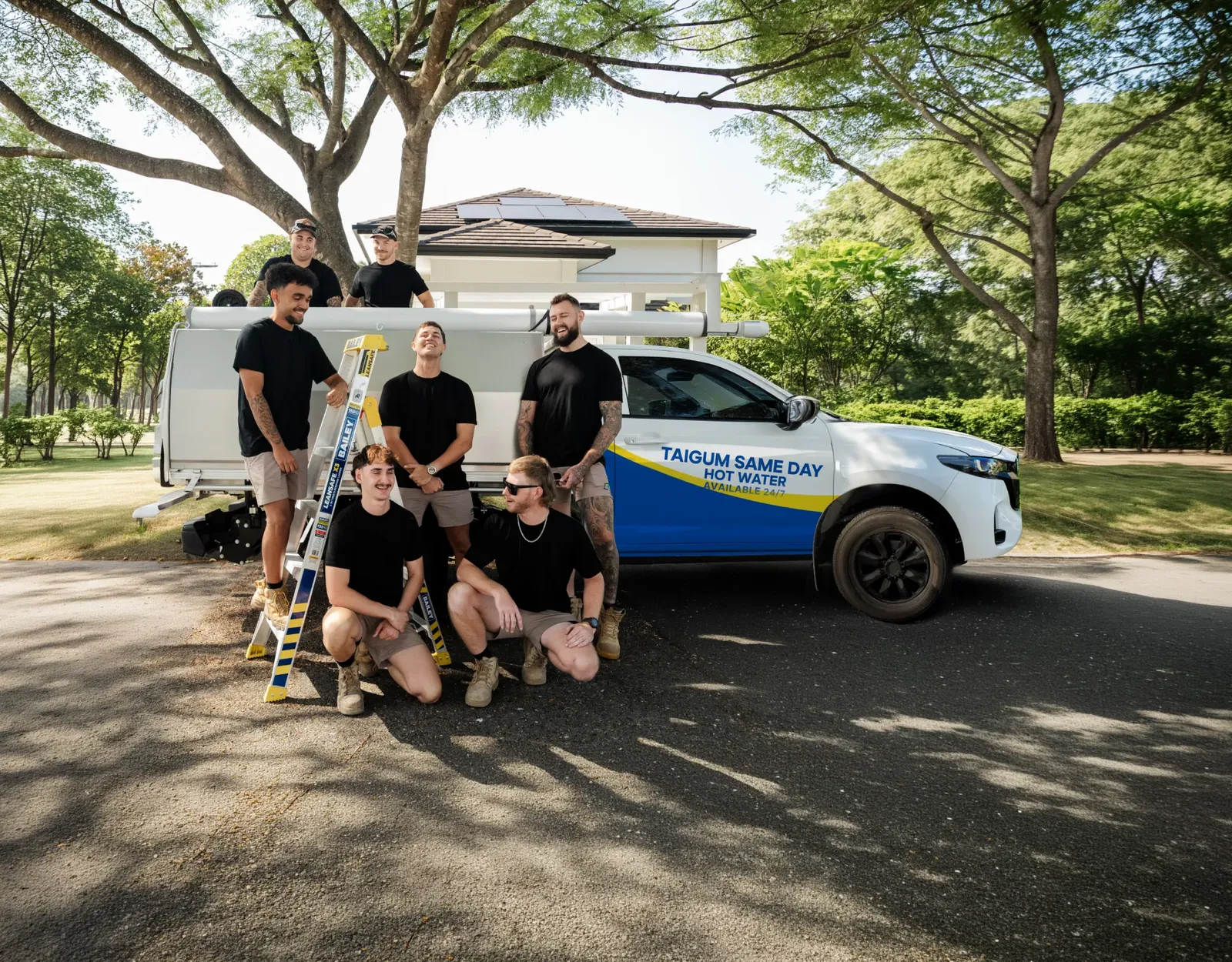 Taigum Same Day Hot Water ute and team
